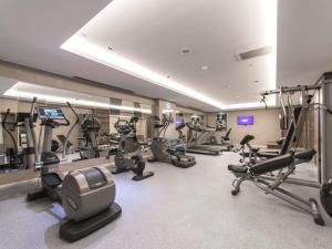 a gym with several treadmills and exercise bikes at Mercure Tbilisi Old Town in Tbilisi City