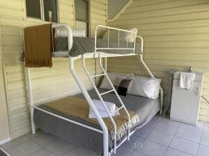 En eller flere senge i et værelse på Chapman Cottage + 7 billeder