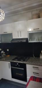 Kuchyň nebo kuchyňský kout v ubytování immeuble karra