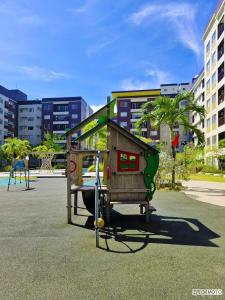 a playground in a park with a play structure at Warm Urban Studio with modern design in Molo