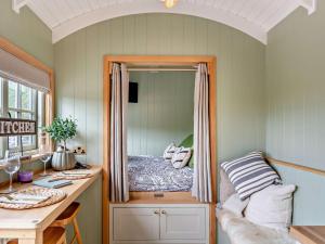 a room with a mirror with a bed in it at 1 Bed in Pateley Bridge 95110 in Sawley