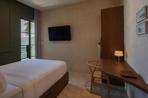 TV a/nebo společenská místnost v ubytování Casa Pistache, colonial hideout