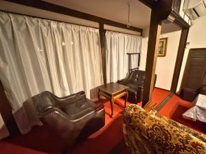 Posezení v ubytování KANAZAWA Retro House NEKO-NOMA