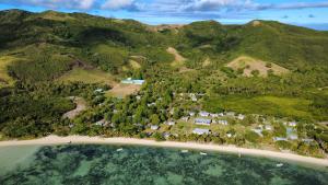 an aerial view of a resort on a beach at Eseroma Homestay in Ngunu