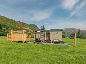 a small shed in the middle of a field at 1 Bed in Patterdale 96153 in Patterdale