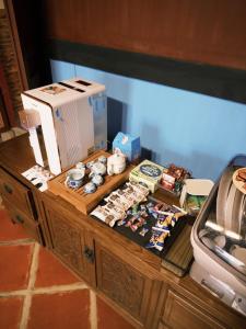 a table with a printer and other items on it at 金玉閣 in Hsia-shih +18 photos
