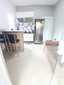 Kuchyň nebo kuchyňský kout v ubytování Casa c AR - condominio prox Parkshopping Campo Grande