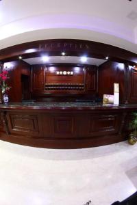 a room with a large organ in a building at Mayor Hotel in Siliguri