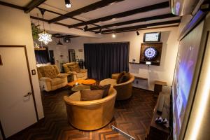 Posezení v ubytování Cinema Resorts 1