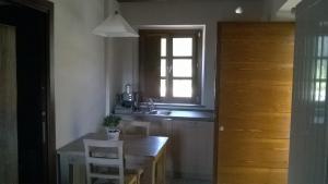 Кухня или мини-кухня в Il Borgo Di Pegui
