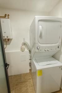a small bathroom with a toilet and a sink at Depamor in Morelia +42 photos