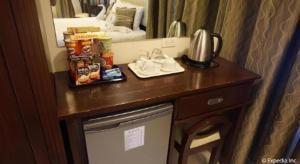 a counter in a hotel room with a sink at Devera Hotel in Angeles