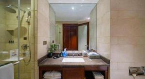a bathroom with a sink and a shower at Days Hotel by Wyndham Hunan Changsha Convoy in Changsha +68 photos