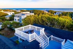 an aerial view of a house with a deck and the ocean at AV3-23: 3 23rd Avenue in Isle of Palms