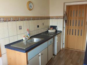 Kuchyň nebo kuchyňský kout v ubytování Apartmány Mikeš + 20 fotografií