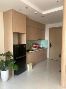 Kuchyň nebo kuchyňský kout v ubytování Góc Nắng HomeStay and Apartment