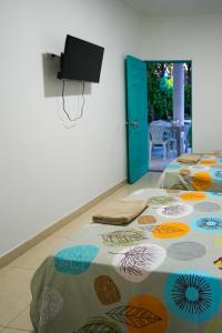 a room with two beds on the floor at Casa Hotel Villa Sabrosura in Mariquita +41 photos
