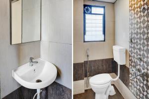 a bathroom with a sink and a toilet and a window at Super Collection O Manjari - Mundhwa Road Formerly 7 Treats in Mundhwa