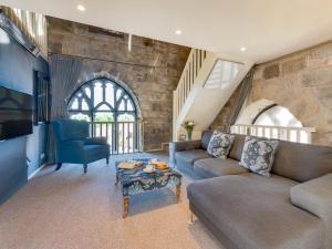 a living room with a couch and a table at 1 bed property in Alnwick 82212 in Alnwick