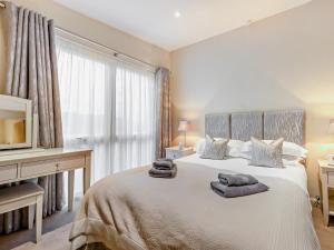 Postel nebo postele na pokoji v ubytování 4 Bed in Windermere 95682