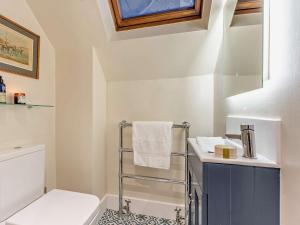 a bathroom with a toilet and a sink at 1 Bed in Gavinton 95832 in Duns +16 photos