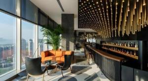 a bar in a building with a view of the city at Twinkle hotel Hangzhou in Hangzhou