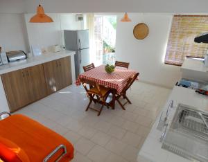 Kuchyň nebo kuchyňský kout v ubytování Blue Appartment