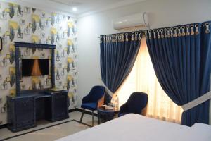 Postel nebo postele na pokoji v ubytování Civic Guest House