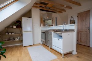 Kuchyň nebo kuchyňský kout v ubytování Penthouse med skråtak og utsikt - Sentralt + 3 fotografie