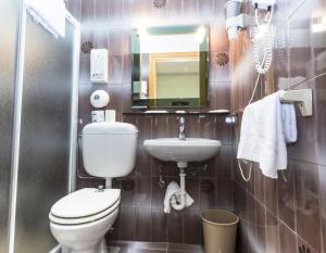 Koupelna v ubytování Camere R 75