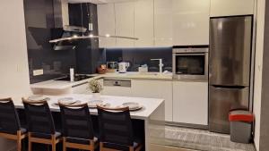 Η κουζίνα ή μικρή κουζίνα στο Apartman Sunce