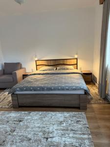 Postel nebo postele na pokoji v ubytování Casa Crisan