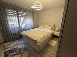 Postel nebo postele na pokoji v ubytování Мия 6 Deluxe