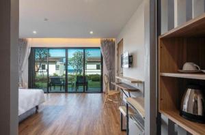 En eller flere senge i et værelse på i Tara Private + 174 billeder