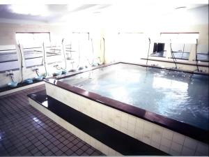 a large pool of water in a swimming pool at Okinawa Sunplaza Hotel in Naha