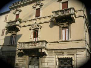 a large building with balconies on the side of it at Ascoli Antica B&B in Ascoli Piceno
