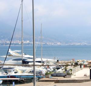 a group of boats are docked at a marina at Almayer La Locanda in Gaeta