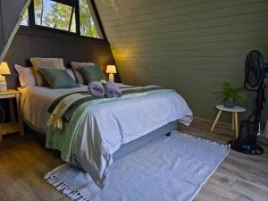 Ένα ή περισσότερα κρεβάτια σε δωμάτιο στο Braai & Bubbles - Modimolle