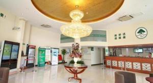 a large lobby with a large chandelier in a pharmacy at GreenTree Inn Shanghai Jiading Anting Motor City Express Hotel in Anting Zhan