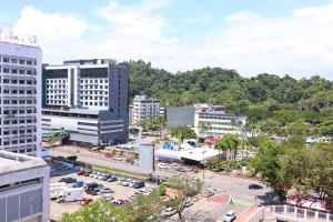 an aerial view of a city with buildings at Homesuite' Home at The Shore in Kota Kinabalu