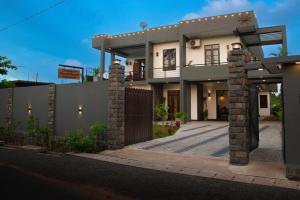 a rendering of a house with a driveway at Cinnamon Forest Villa - Private Luxury Villa in Hikkaduwa in Hikkaduwa