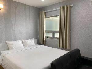 Ένα ή περισσότερα κρεβάτια σε δωμάτιο στο Juna hotel - Condotel +40 φωτογραφίες