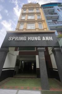 a building with a sign that reads spring hung am at Spring Hung Anh Hotel - Sân Bay TSN in Ho Chi Minh City