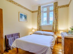 Ένα ή περισσότερα κρεβάτια σε δωμάτιο στο 3 Bed in Pooley Bridge 80430