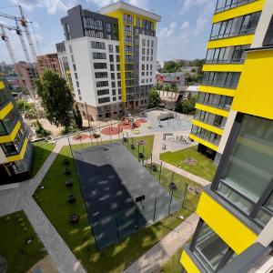an aerial view of a city with tall buildings at Green Home in Ternopilʼ