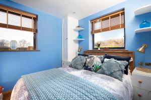 Ένα ή περισσότερα κρεβάτια σε δωμάτιο στο Enchanted Lodges - Maroc