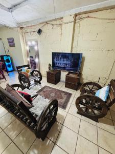 TV a/nebo společenská místnost v ubytování Arianas Place 1