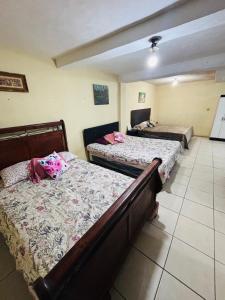 Postel nebo postele na pokoji v ubytování Arianas Place 1