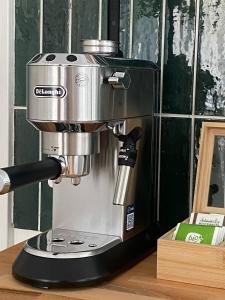 a mixer sitting on top of a stand at Modernes Designer Loft mit Flair in Hochheim & Tiefgarage in Hochheim am Main +10 photos
