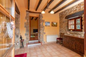 TV a/nebo společenská místnost v ubytování Casa Rural Can Met